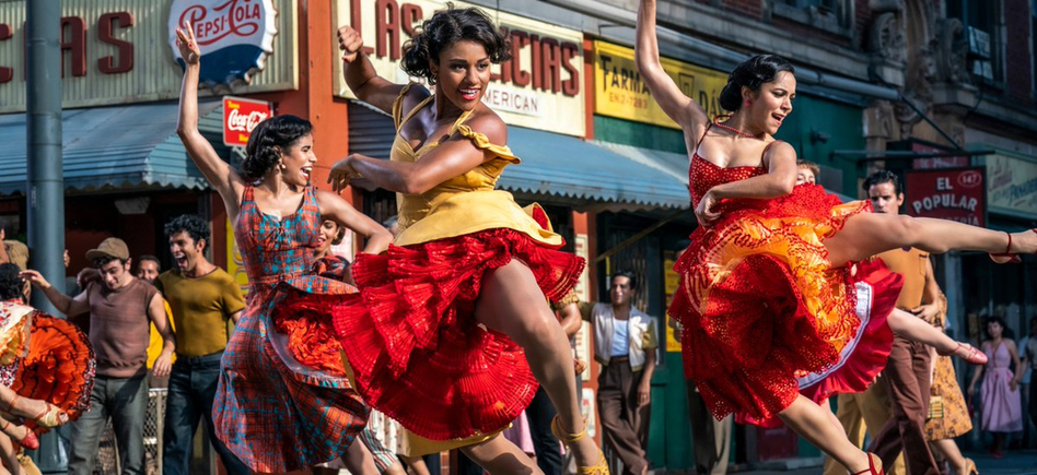 Anita (Ariana DeBose) dances in the streets, backed by other women dancers.